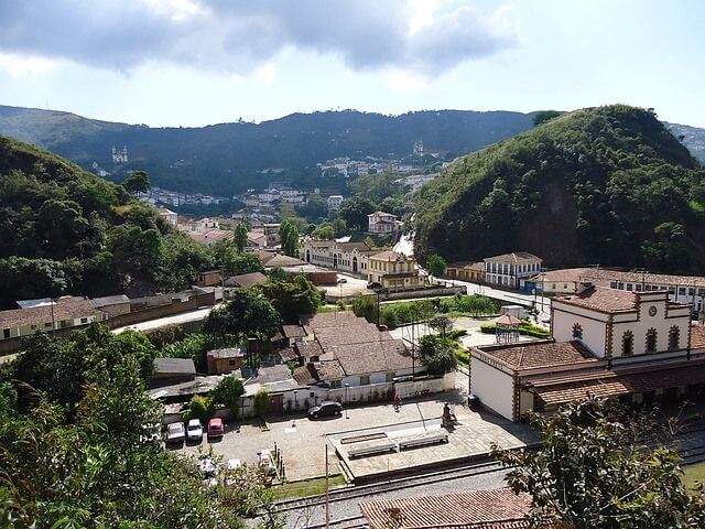Colonial buildings and lush hills in the town of Ouro Preto in Minas Gerais, Brazil