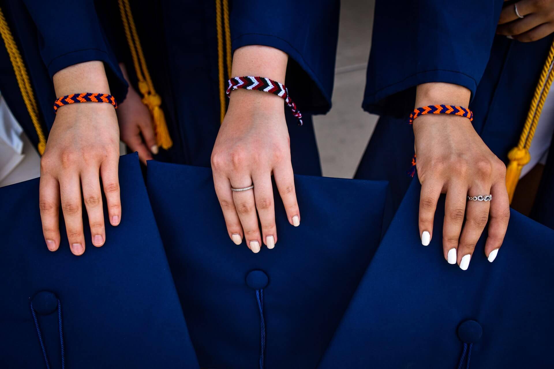women-wearing-graduation-jewelry