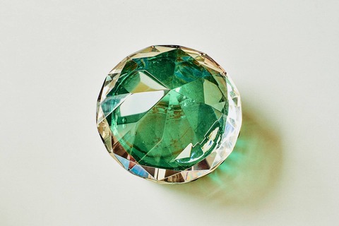 A round Emerald gemstone